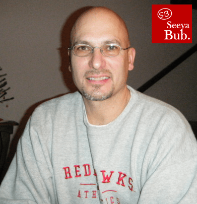 dad-in-redhawks-sweater-with-sb-logo