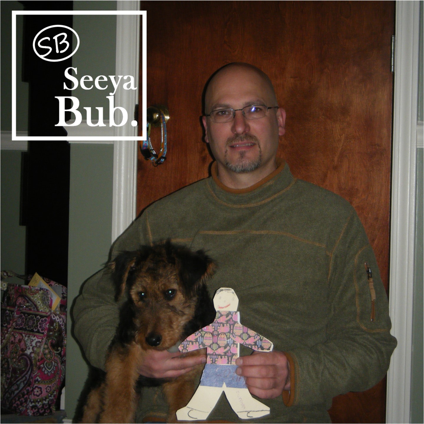 Dad with Flat Stanley and SB Logo