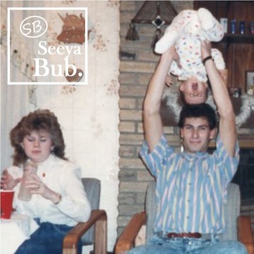 Dad Holding Me Upsdie Down with SB Logo